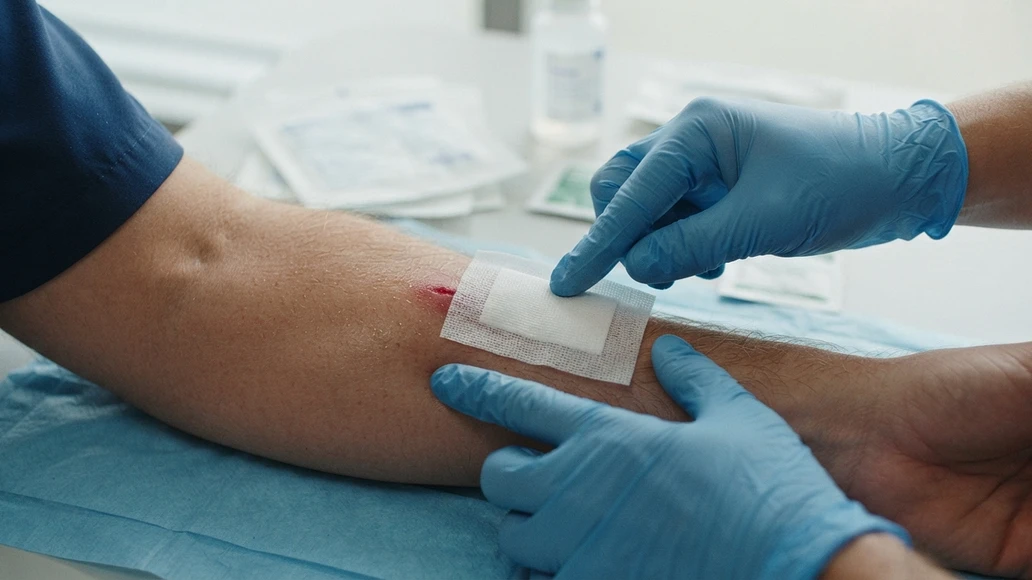 Applying a clean dressing to a minor wound